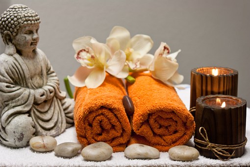 health club spa services with flowers and towels as well as spa equipment for treatments